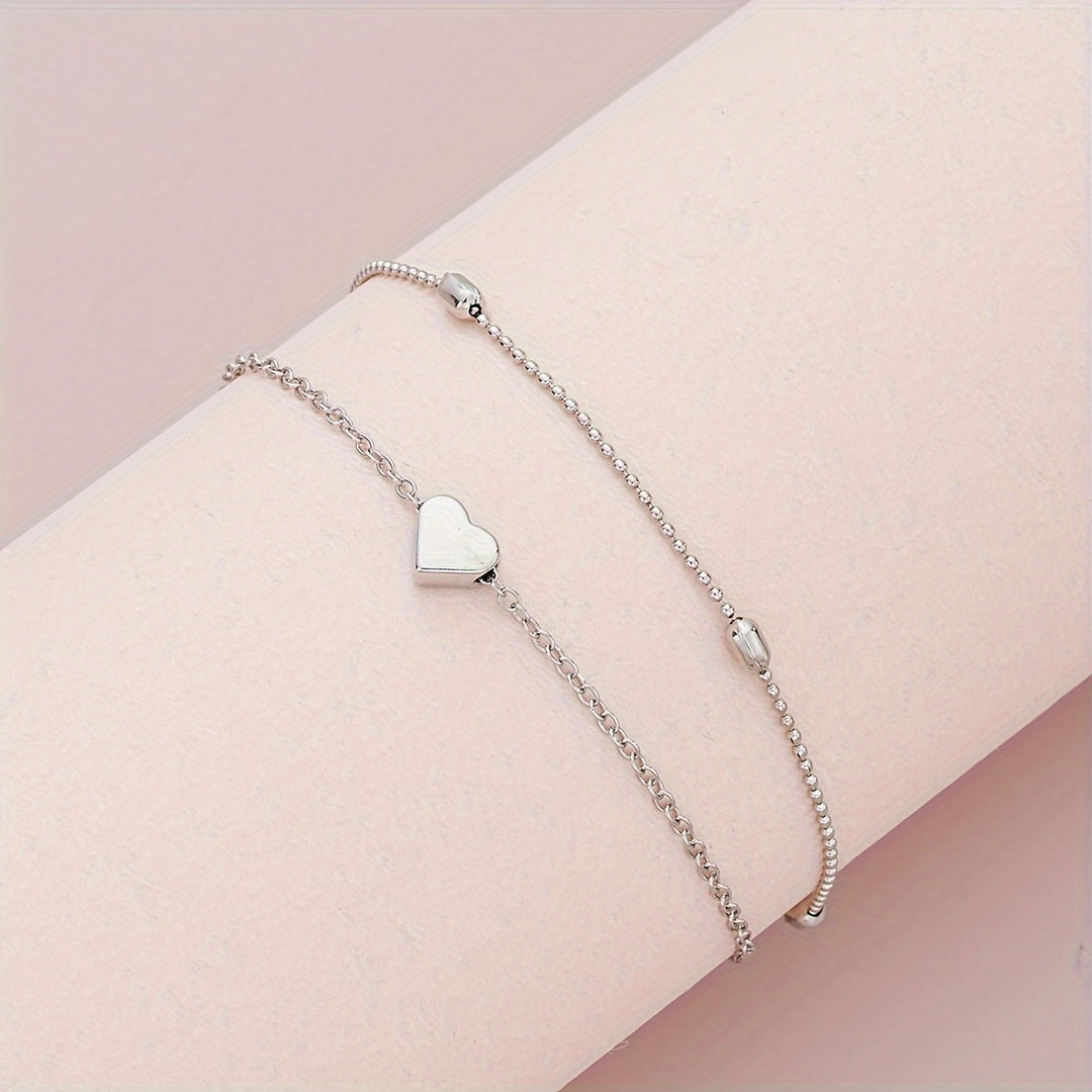 Set collana e bracciale con cuore e perle