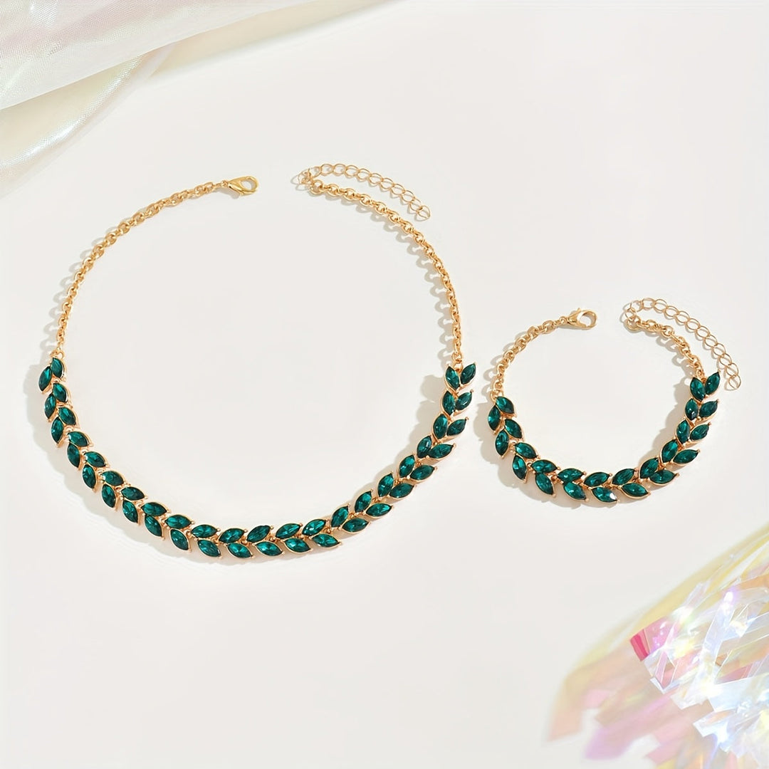 Set collana e bracciale con cristalli verdi
