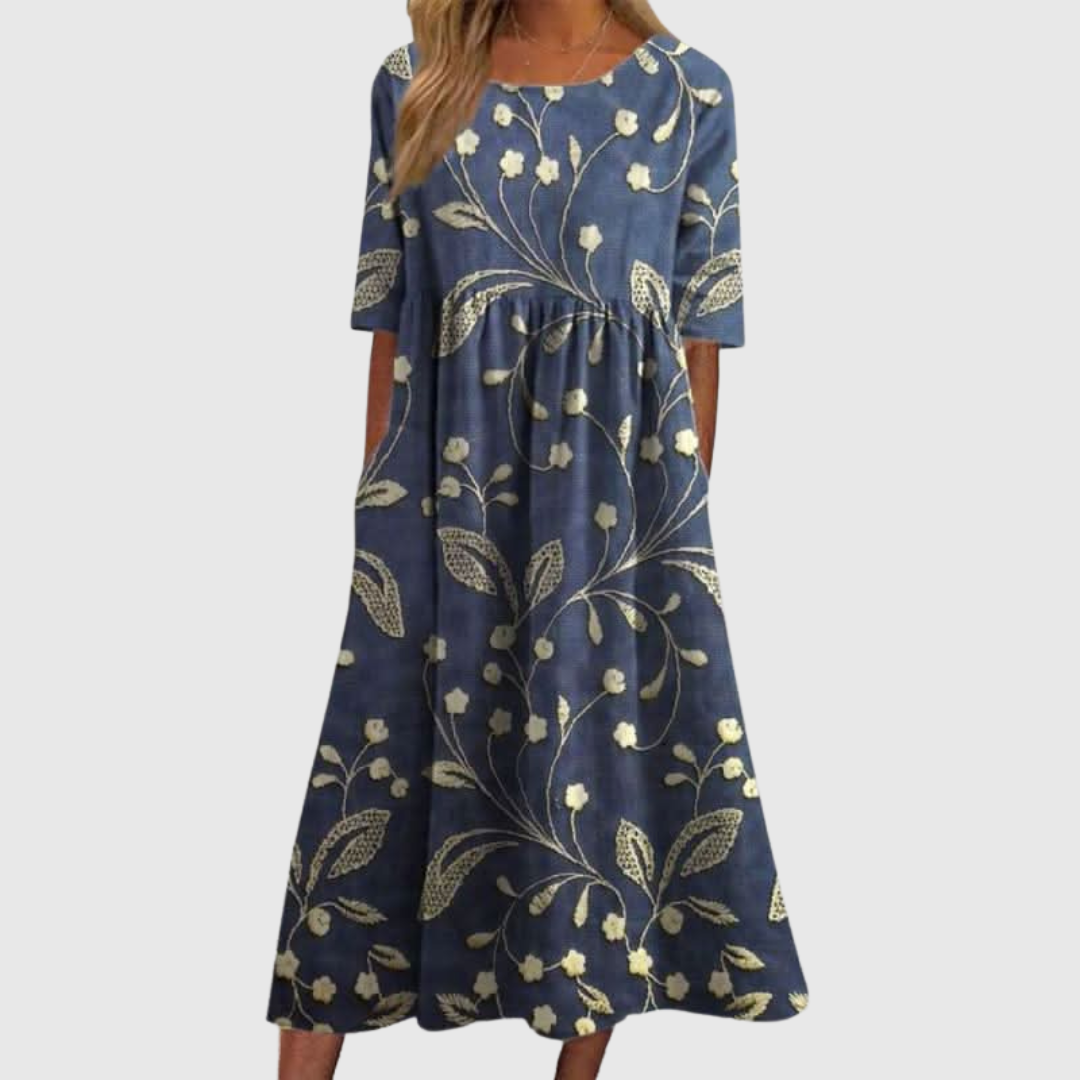 CLARA | ABITO MIDI FLOREALE DALLA LINEA MORBIDA