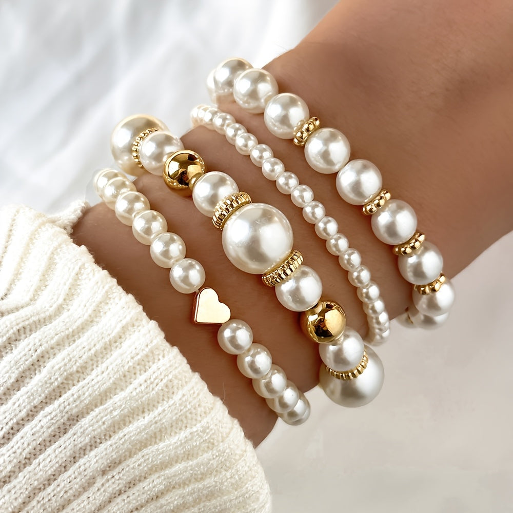 Set di bracciali con perle e cuore