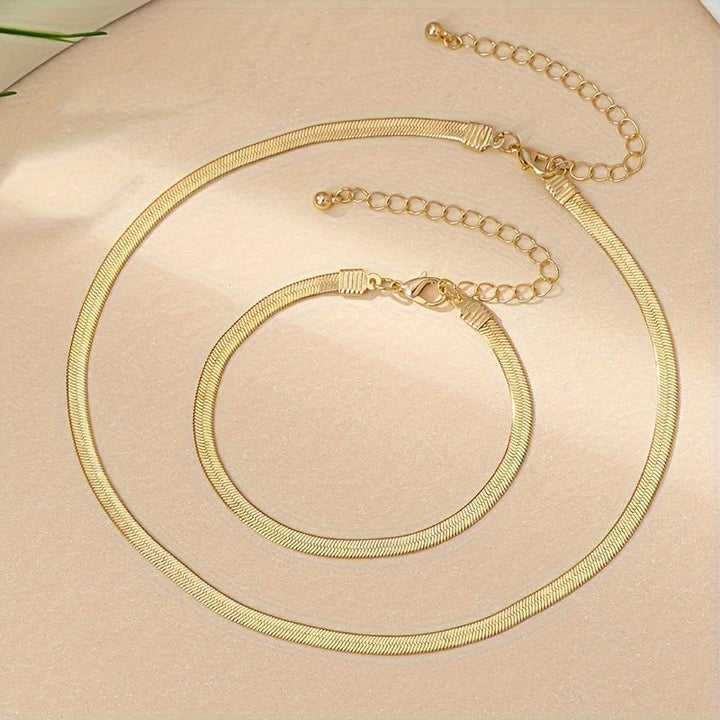 Set collana e bracciale a catena serpente