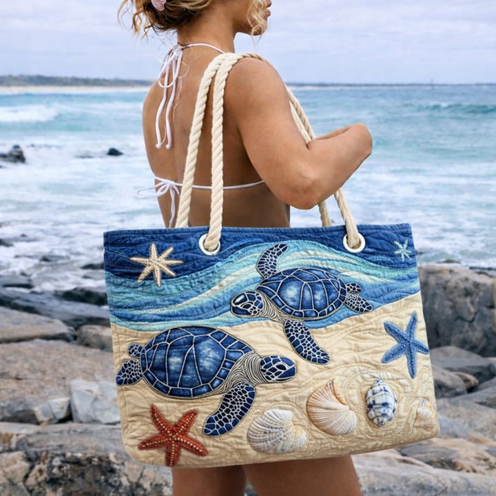Borsa mare trapuntata Tartaruga nell’Oceano disponibile nelle misure L e XL