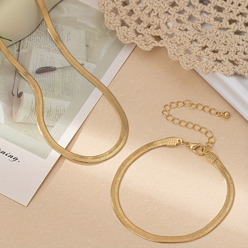 Set collana e bracciale a catena serpente