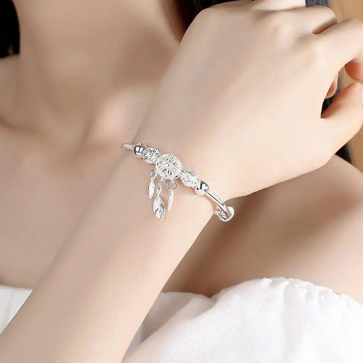 Bracciale argentato acchiappasogni